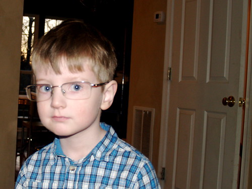 Brian tries on my glasses.